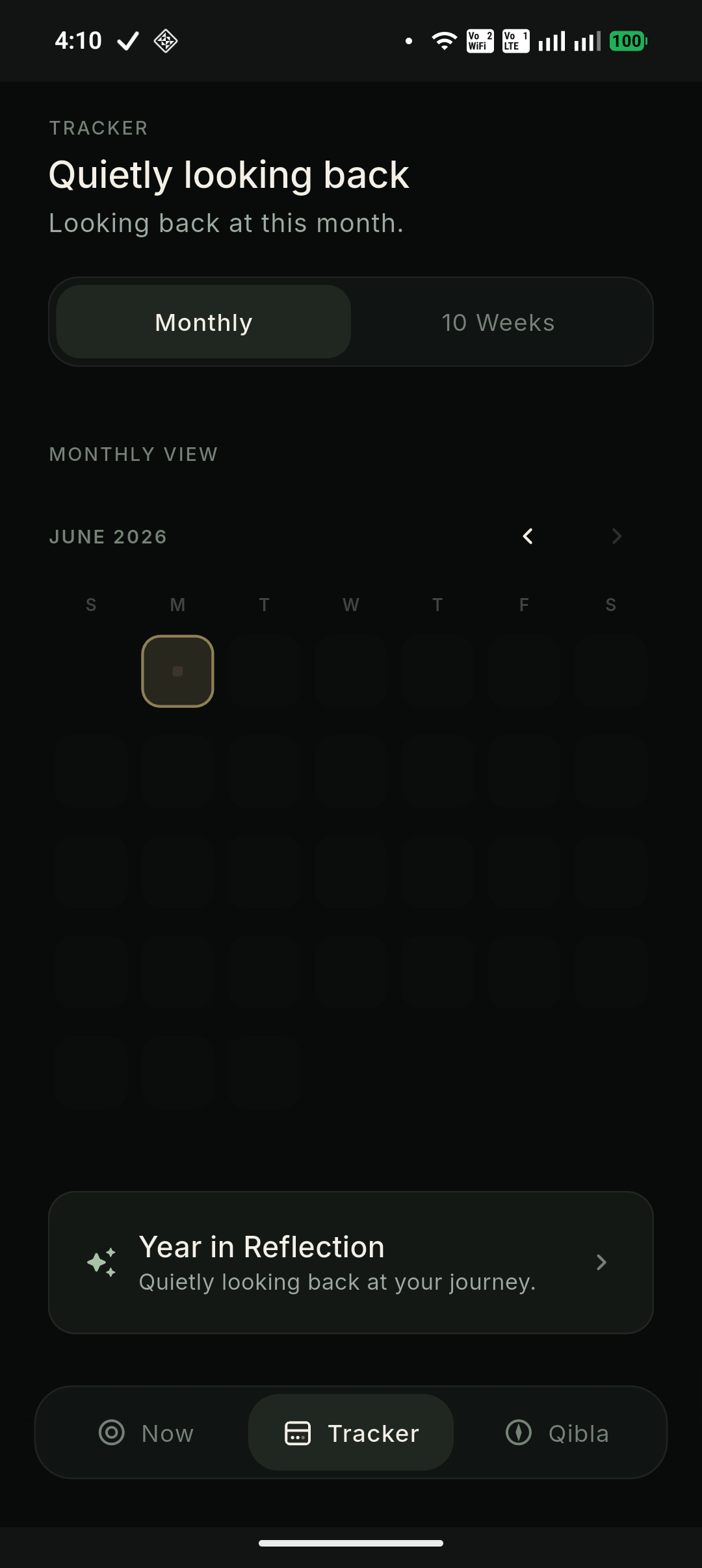 The Tracker screen: a quiet monthly calendar view for personal reflection, titled Quietly looking back